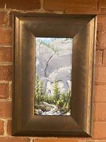 Front view of framed acrylic landscape painting