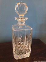 Full view decanter with stopper showing starburst cuts