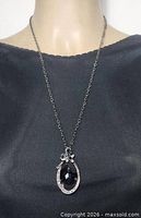 Necklace on bust form showing chain length and pendant size