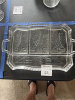 Top view of entire divided tray showing five compartments and tree pattern