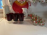 Group shot showing all glasses, carafe and pitcher