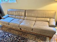Full view of both leather sofa sections joined