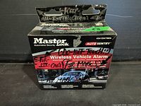 Front of Master Lock Auto Sentry 4841DATSEN box showing branding, model and handwritten markings