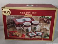 Front of sealed Spode Christmas Tree tin set box showing contents