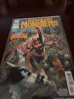 Front view of Gotham City Monsters #4 in bag with board
