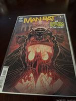 Front view of bagged Man-Bat #1 variant comic showing full cover art and issue details