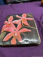Front view of floral-cover spiral album