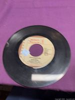 Entire record showing both grooves and center label
