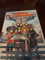 Front cover of Teen Titans Academy #2 comic in sleeve