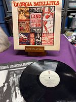 Front jacket, printed inner sleeve edge, record on table