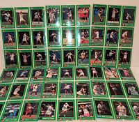 Front view of complete spread of 67 NetPro tennis cards