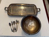 Tray, bowl and flatware layout showing contents and scale