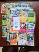 Stacked view of full assortment of cards.