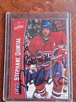 Front view of autographed Stéphane Quintal Molson Export card in sleeve