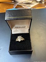 Ring in open black presentation box showing label Sterling Silver Made in Ireland