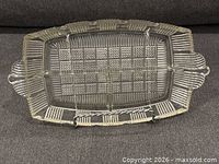 Top view of rectangular pressed glass relish tray showing grid pattern and divider