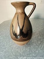 Full view of Blue Mountain Pottery pitcher showing shape and glaze pattern