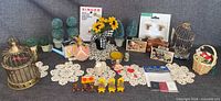 overview of all miniature items laid out on fabric background