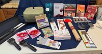 Group shot showing all items including electric skillet, utensil sets, wine set and gadgets