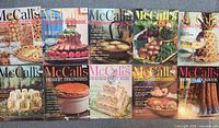 Ten McCall’s cookbooks laid out, front covers visible