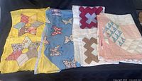 All four textile pieces laid out
