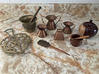 All items arranged on countertop showing full lot