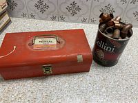 Toolbox and Cellini can of copper fittings