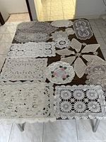 Full overhead view of all lace and linen pieces on table