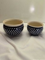 Both bowls front view showing pattern and size difference