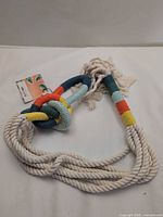 Coiled multicolor cotton macramé plant hanger displayed