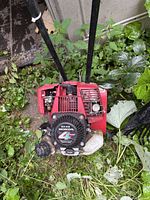Top view of Honda GX22 tiller showing engine cover and handles