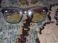 Front view of dark blue rectangular eyeglasses