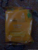Front of sealed yellow pack showing Global Beauty Care branding, Sunflower & Honey variant, 25 count.