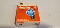 Front of Autolite No.23 spark plugs box showing branding and quantity