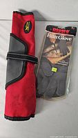 Roll-up knife case beside packaged Rapala fillet glove