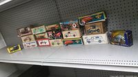 Shelf view of all 17 boxed die-cast items
