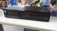 Front view showing Fisher Studio-Standard stereo amplifier controls