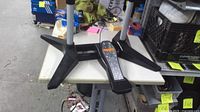 Base of stand with wired orange pedal