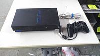 Console, controller and power cord top view