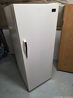 Front view of white upright freezer