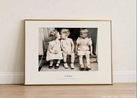 Front view of framed Il Bacio print showing image, mat and frame