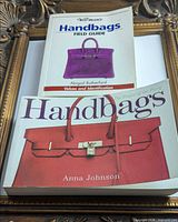 Front covers of both handbag reference books