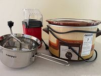 Mirro food mill, GE slow cooker, popcorn popper grouped