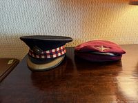 Scots Guards peaked cap and paratrooper beret side by side