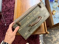 Top of box showing Air Ministry crown, "A M", Astrograph Mark text, latch and hinges