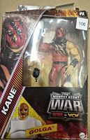Front of damaged box showing Kane figure and accessory
