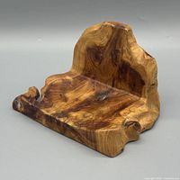 Front angled view showing overall shape and wood grain