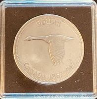 Reverse of 1967 Centennial silver dollar showing Canada Goose