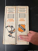 Front of O-Pee-Chee NHL card locker box with NHL logo and player graphic
