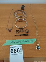 Full lot layout showing all jewelry pieces